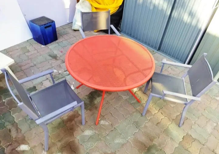 Orange Outdoor Table with 3 chairs